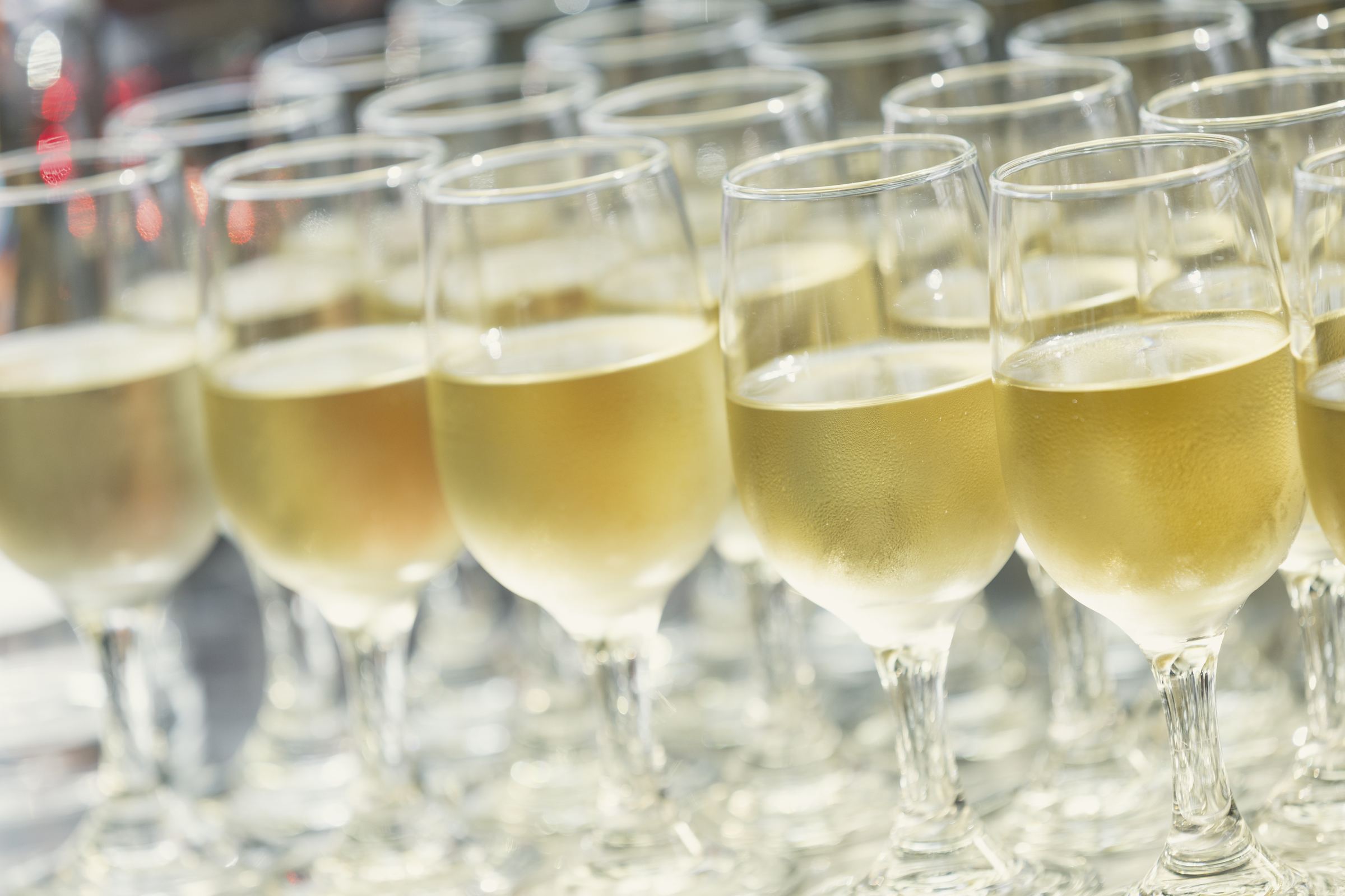 Rows of poured champagne glasses