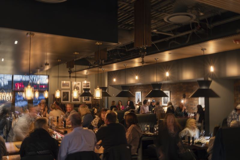 A full dining room at Domenic’s on a busy evening