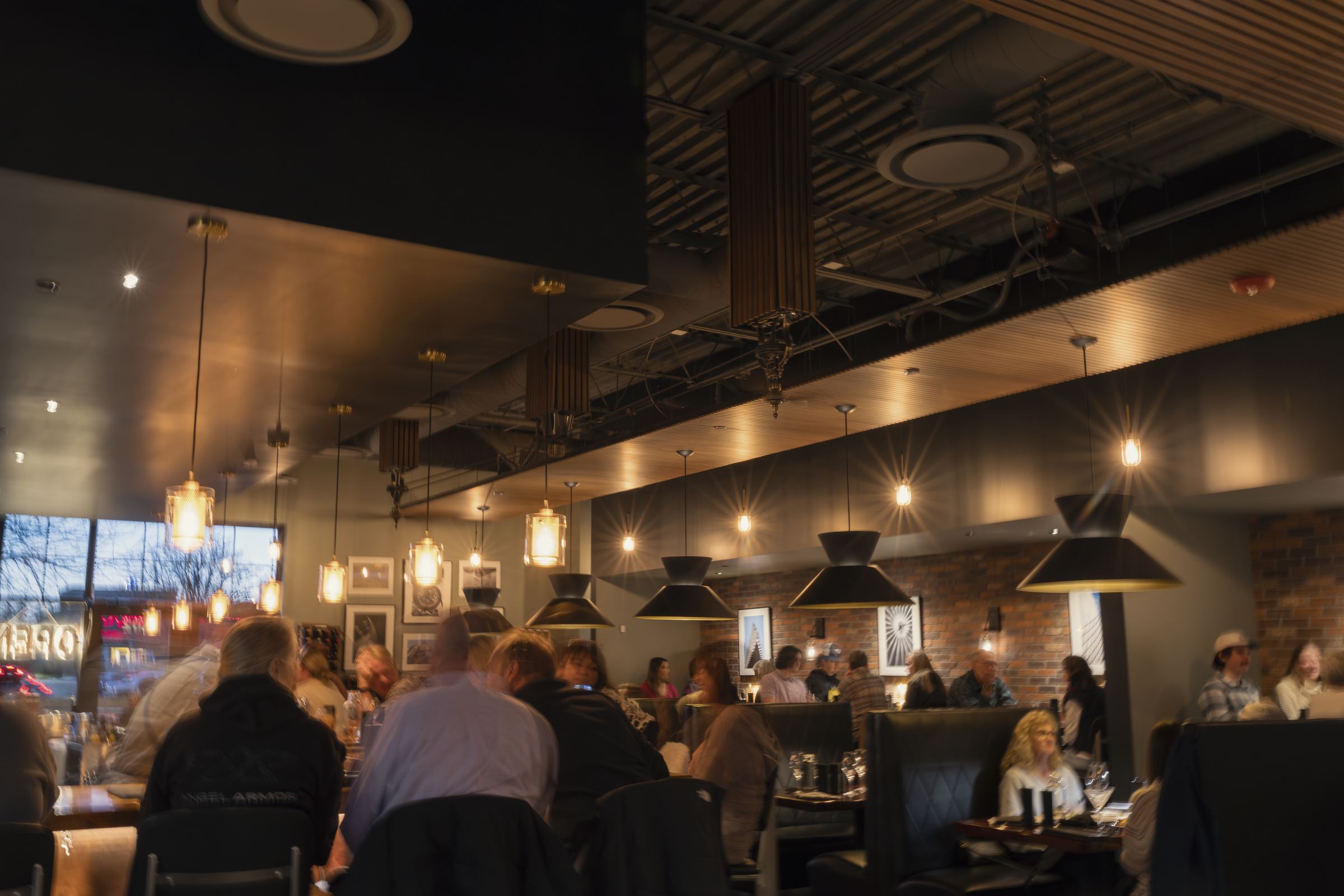 A packed Saturday night in the dining room at Domenic’s Bistro & Wine Bar
